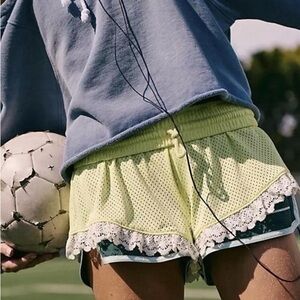 Free people Women's Athletic Lace Trim Shorts in Light Yellow